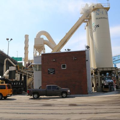 Two partners walking hand-in-hand on a beautiful lane